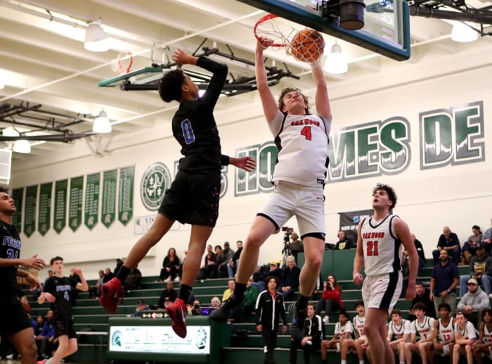Oakwood's Nakita Kochnev sends down a dunk in the second half.